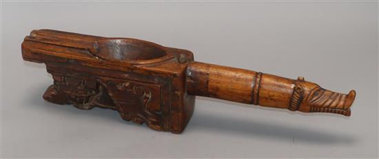 An Indian treen ritual object length 43cm
